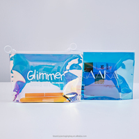 Sacs d'emballage holographiques de luxe de nouveau style avec logo personnalisé sac à fermeture éclair en plastique laser réutilisable pochette à glissière en pvc à paillettes