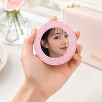 Miroir compact rond en PU imprimé par sublimation personnalisé, léger et portable, idéal pour les sacs à main, les cadeaux promotionnels et les retouches.
