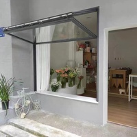 NUOXIN Venta al por mayor Comercial Negro Vertical Up Bi-plegable Ventana Doble vidrio Aluminio Ventanas plegables