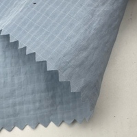 Tissu Ripstop tissé 100 % nylon métallisé à filament unique, grille 0,2x0,3 cm, léger, imperméable, coupe-vent pour doudoune de fille