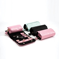 Organisateur de bijoux de voyage, étui en cuir, sac à roulettes, sac à bijoux pliable et portable pour boucles d'oreilles, clous, bagues, colliers