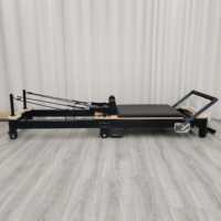 Vente en gros de lit d'entraînement Pilates pliable portable personnalisé noir en alliage d'aluminium pour usage domestique