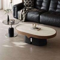 Table basse ovale de luxe italienne moderne style Bauhaus Creative Cloud avec plateau en marbre et structure en bois pour salon et appartement