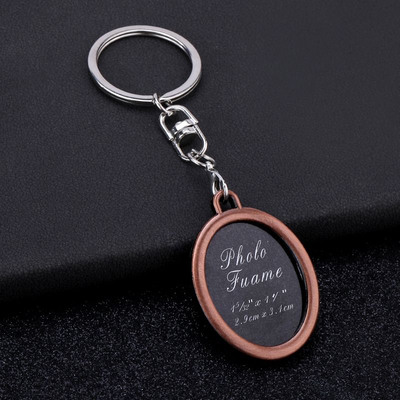 hot-selling key chains, oval-shaped personalized photos, European and ...