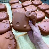 Jouet KT à grosse tête en PU, doux, collant, parfum chocolat et lait, très populaire auprès des jeunes et adolescents