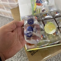 Bonbons durs aux fruits Chiboki en trois couleurs, série en forme de bouteille, remplissage de vaseline non-rétractable, boule faite à la main, vente directe d'usine