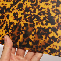 Feuille d'acétate de cellulose colorée en écaille de tortue noire pour bijoux, lunettes et montures de lunettes.