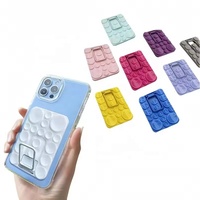 Support de téléphone portable universel 2-en-1 en silicone coloré, anti-perte, avec base stable et ventouse puissante réglable pour bureau/table
