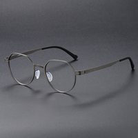 Nouvelles Lunettes Optiques Rondes en Titane pour Myopie 80992 – Montures de Lunettes de Vue Unisexe pour Professionnels