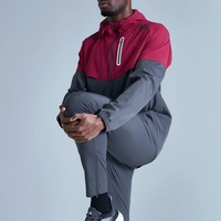 Survêtement 100% polyester coupe-vent imperméable avec empiècements en maille respirante extensible dans les quatre sens et poches réfléchissantes