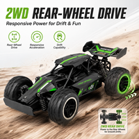 Voiture RC tout-terrain 2.4GHz 2WD télécommandée avec deux batteries, amortisseurs et pneus en caoutchouc