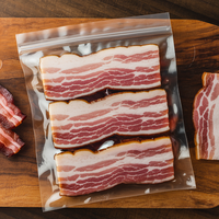 Sacs sous vide transparents imprimés directement par le fabricant pour l'emballage de bacon, de saucisses et de viandes séchées
