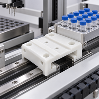 Bloc coulissant en POM usiné sur mesure par CNC pour systèmes automatisés de transfert d'échantillons