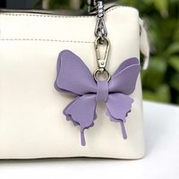 Porte-clés papillon en cuir PU double couche coloré et tendance avec fermoir métallique, cadeau promotionnel, breloques pour sacs femme