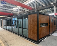 Maison préfabriquée modulaire extensible en conteneur, texture bois, grande paroi vitrée, portable, pour jardin et complexe hôtelier