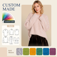 Pull-over doux et ample en mélange alpaga-mérinos pour femme, col rond, idéal pour toutes les saisons et les superpositions.