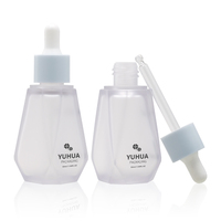 Flacon compte-gouttes 50 ml en PETG pour sérum et lotion d'huiles essentielles, emballage cosmétique pour soins de la peau avec bouton poussoir et sérigraphie