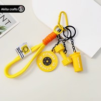 Porte-clés créatif sportif en PVC en forme d'haltère, mini pendentif haltère, breloque pour sac à dos d'étudiant ou voiture, style moderne et minimaliste