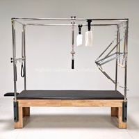 Cama Reformer de Pilates Clásica de Roble de Alta Calidad Highwind Professional con Trapeze Combinado para Estudio