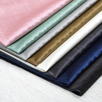 Tissu de polyester pongé de revêtement de papier de dégagement personnalisé parfait pour les uniformes, les vêtements promotionnels et les vêtements de marque