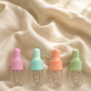 Wholesale Glass Dropper <b>Bottle</b> Empty Clear Dropper <b>Bottles</b> with Colored Cap for Essential <b>Oil</b> Serum Cosmetic Packaging - Product Image 5