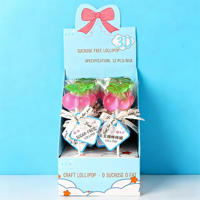 Sucettes dures fruitées sans sucre de 20g (motifs Dauphin, Licorne, Marguerite, Cerise, Queue de Sirène, Astronaute) en sachet pelliculé