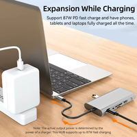 Hub USB-C multiport 11-en-1 en alliage d'aluminium avec USB 2.0, lecteur de cartes SD/TF 4K HDTV et chargement PD - En stock