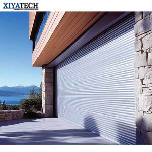 XIYATECH <span class=keywords><strong>Porte</strong></span> <span class=keywords><strong>de</strong></span> <span class=keywords><strong>garage</strong></span> extérieure à enroulement motorisée en métal moderne personnalisée à roulement rapide automatique en aluminium industriel résistant aux chocs - Product Image 1