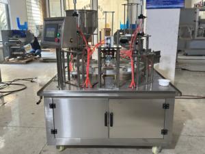 Máquina automática <span class=keywords><strong>de</strong></span> sellado <span class=keywords><strong>de</strong></span> Llenado <span class=keywords><strong>de</strong></span> líquidos <span class=keywords><strong>de</strong></span> yogur <span class=keywords><strong>de</strong></span> miel <span class=keywords><strong>de</strong></span> tipo rotativo para vasos <span class=keywords><strong>de</strong></span> plástico - Product Image 4