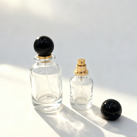 Flacon de parfum en verre cylindrique d'inspiration vintage avec pulvérisateur à pompe circulaire, atomiseur à pression, vente en gros, directement de l'usine