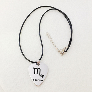 قلادة على شكل نجمة زودياك, قلادة من الفولاذ المقاوم للصدأ بتصميم مخصص 12 علامة زودياك ، قلادة قيثارة مع حبل من الجلد - Product Image 4