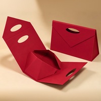 Boîtes pliantes à poignée triangulaire sur mesure, boîtes cadeaux personnalisées de couleur unie, vente directe d'usine