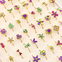 Boîte de 100 bagues pour femmes en acier inoxydable plaqué or, tendance, avec motif papillon et taille ajustable