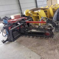 Minicargadora de zanjas con accesorio de zanjadora de granja motorizada a la venta para cadenas de tractor
