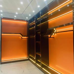 ตู้โชว์เสื้อผ้าสไตล์ใหม่ดีไซน์แฟชั่นโลหะสำหรับตกแต่งร้านขายเสื้อผ้าดีไซน์ใหม่ - Product Image 4