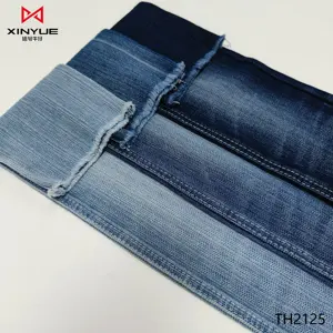 Hot Selling 67%Cotton 29%Polyester 3%Viscose 1%Spandx jacquard denim fabric Shrinkage Resistant INDIGO Fancy And Fashion