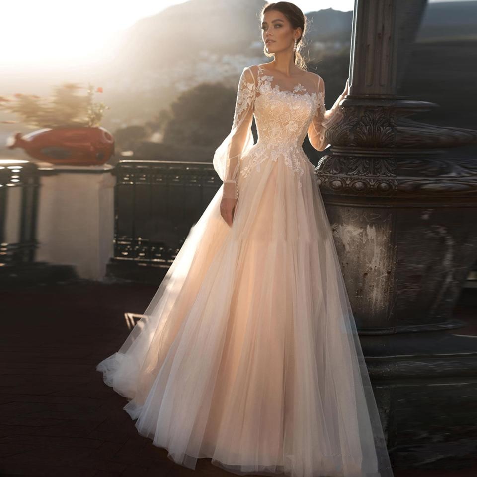 champagne colored beach wedding dresses Champagne Lace Applique Mermaid Weeding Dress with Spaghetti Straps, Deep V-Neck, and Court Train