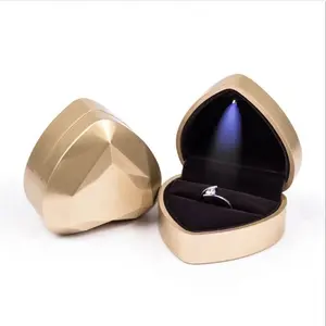 Пользовательская Роскошная золотая кожаная бумага, уникальная светодиодная подсветка в форме сердца, шкатулка для колец ювелирных изделий