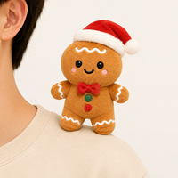 Fournisseur de jouets en peluche personnalisés pour Noël : Homme en pain d'épices magnétique à porter à l'épaule, et compagnon de fête personnalisable à porter à l'épaule. Usine de jouets en peluche.