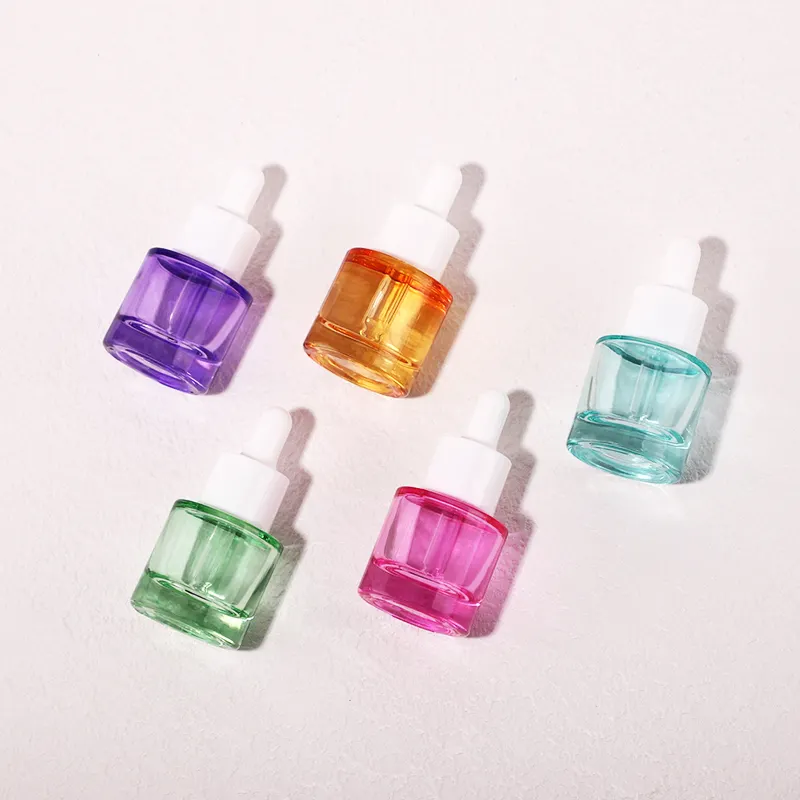 סין manufatural מותאם אישית צבעוני 20 מ "ל בקבוק זכוכית עבה עם dropper עבור אריזת טיפוח העור חיוני אריזה