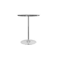 Table de bistrot, pub ou bar contemporaine élégante avec plateau rond en marbre noir et piétement haut chromé sur pieds.