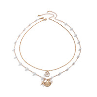 Ensemble de colliers multicouches tendance en alliage avec imitation perles, coquillages et étoiles de mer, style européen et américain, pour femmes