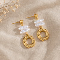 Boucles d'oreilles pendantes en acier inoxydable texturé, motif feuille de perle irrégulière, pour femme, bijoux de niche délicats et élégants, vente chaude