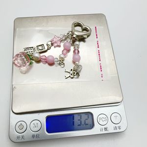 Y2K <span class=keywords><strong>guitarra</strong></span> llavero dulce arco corazón estrella llaveros Kawaii teléfono móvil encanto teléfono caso cadena colgante fruta fresa llavero - Product Image 4