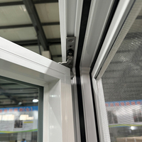 Ventana Abatible de Vinilo Blanco de Gran Tamaño con Una Sola Hoja, Apertura Lateral, con Rejillas Entre Vidrios y Mosquitera Permanente de Fibra de Vidrio, Precio de Fábrica