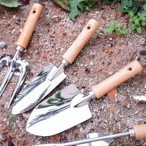 7-piece <b>gardening</b> <b>tool</b> <b>set</b> for home use: shovel, rake, heavy-duty shears, root cutter, stainless steel shovels of various sizes. - Product Image 1