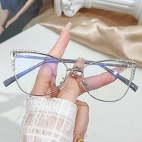 Lunettes de vue œil de chat en strass pour femmes, monture métallique, anti-lumière bleue, verres optiques décorés de cristaux, montures de lunettes tendance pour dames