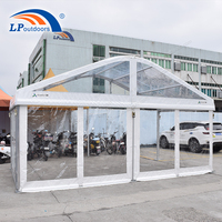 Tente transparente de luxe 6x15M 6x20M 6x25M avec porte en verre pour les événements clients vip cinq étoiles