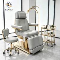 Table de traitement électrique moderne en PVC, 4 moteurs, lit de massage réglable en hauteur, base stable pour salon de beauté et de thérapie