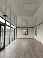 Maison conteneur préfabriquée détachable 20ft 40ft, design moderne de luxe, mur-rideau en verre noir, villa/appartement en acier respirant